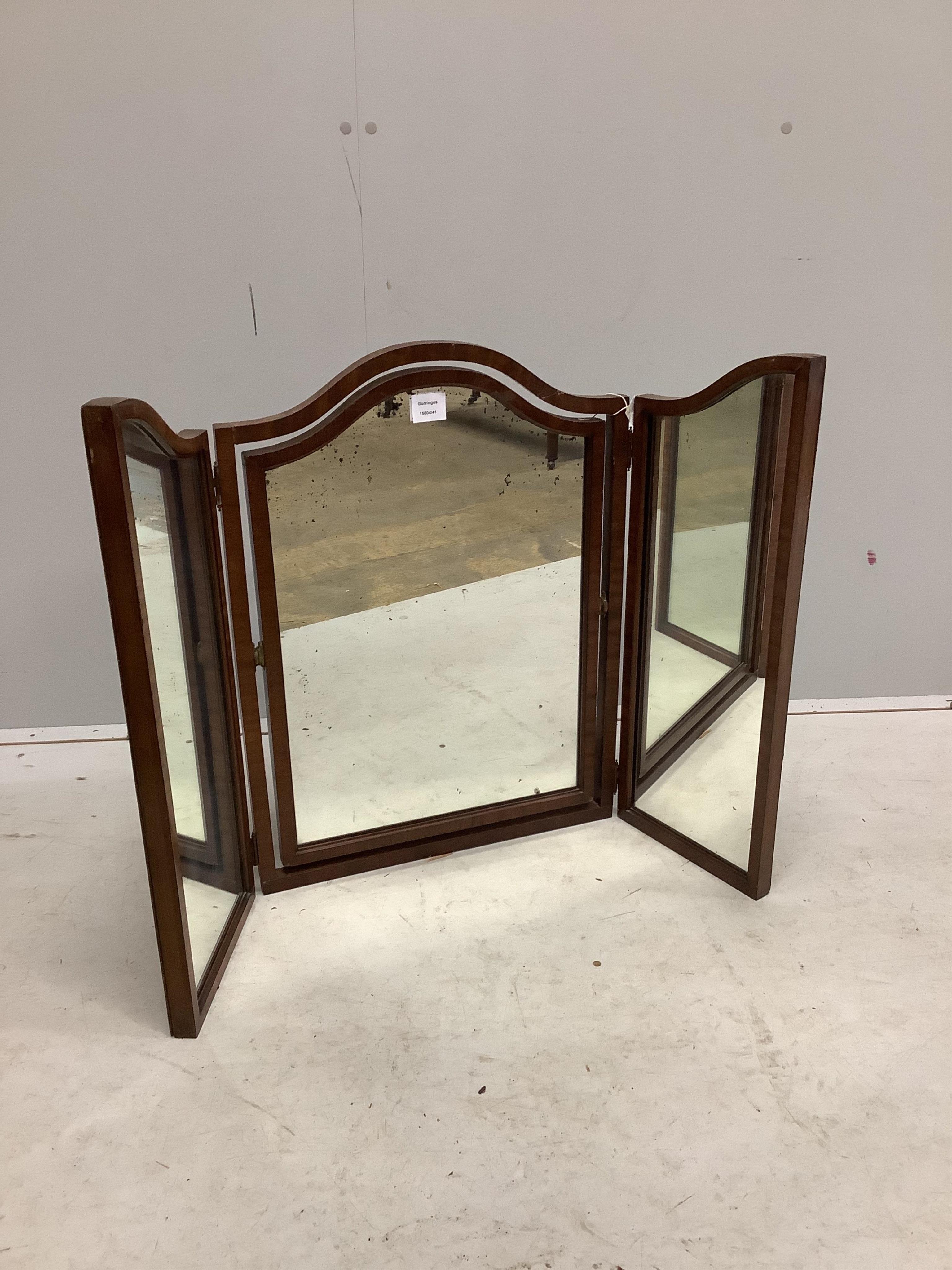 An early 20th century mahogany triple plate toilet mirror, height 67cm. Condition - fair, plate spotted